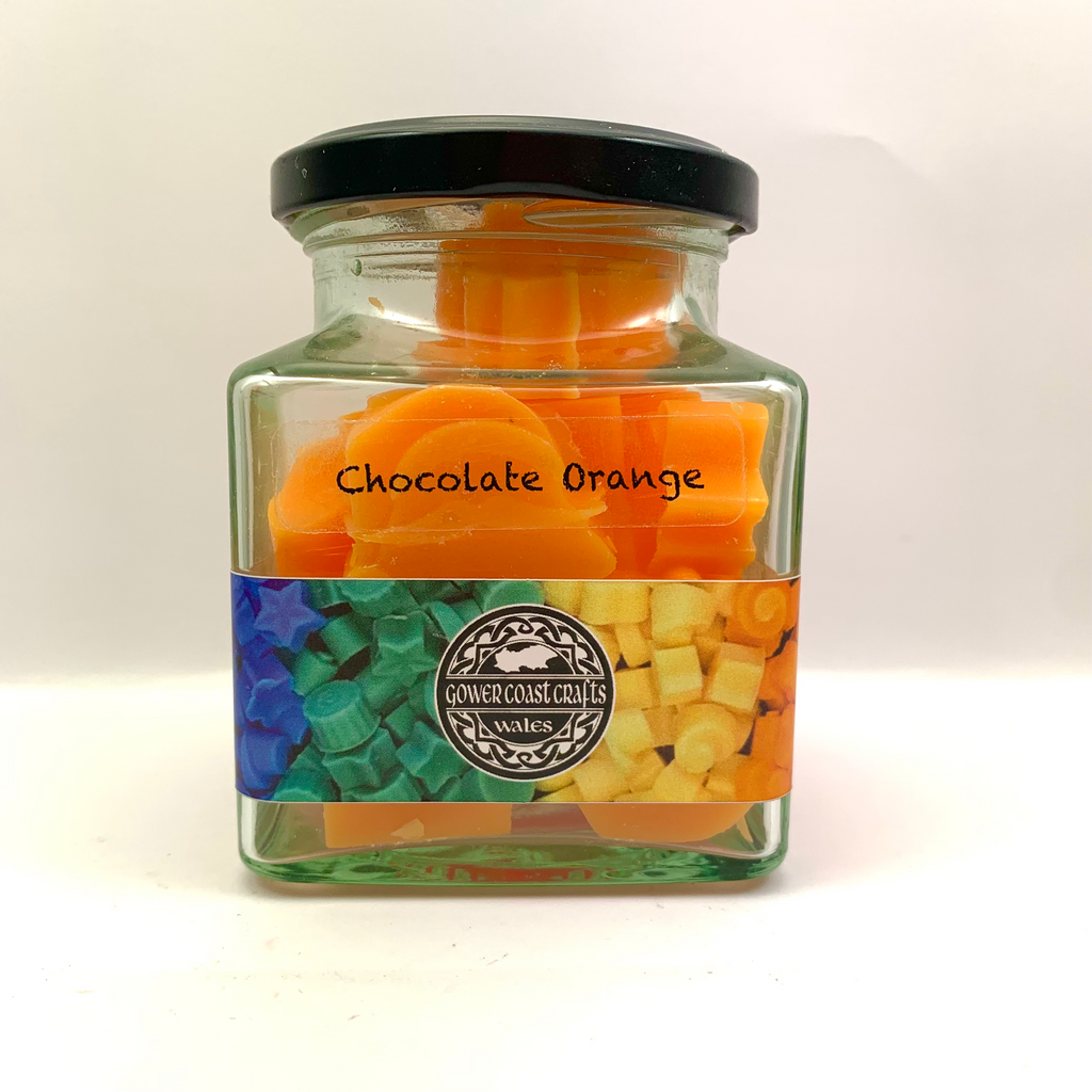 Jar of Chocolate Orange Scented Wax Melts in Christmas Shapes