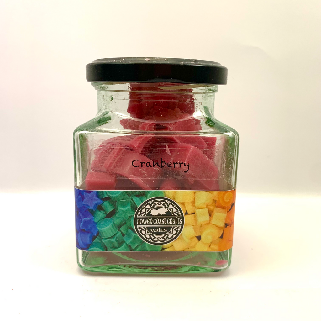 Jar of Festive Cranberry Scented Wax Melts in Christmas Shapes