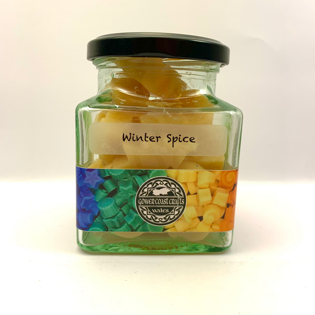 Jar of Winter Spice Scented Wax Melts in Christmas Shapes